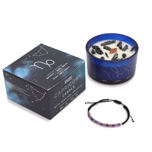Zodiac Crystal Candle Capricorn with Gemstone Bracelet is beautifully presented in a midnight blue glass jar adorned with silver-embossed star sign constellations.