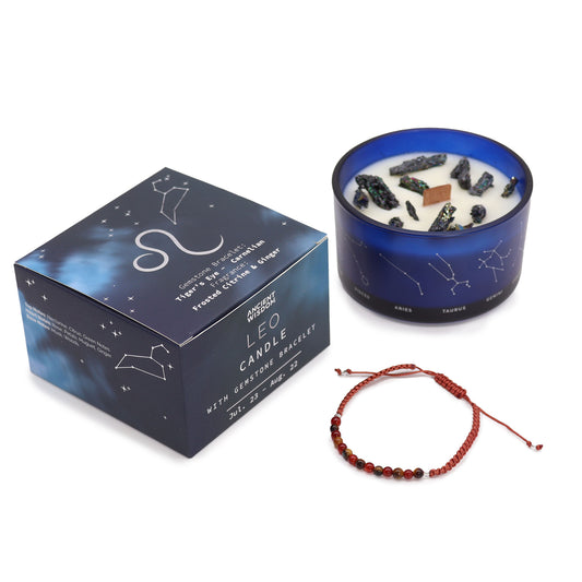 Zodiac Crystal Candle Leo with Gemstone Bracelet is beautifully presented in a midnight blue glass jar adorned with silver-embossed star sign constellations. 
