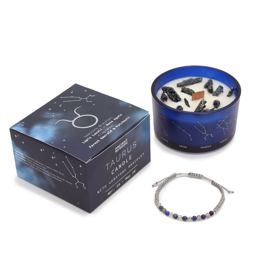 Zodiac Crystal Candle Taurus with Gemstone Bracelet is beautifully presented in a midnight blue glass jar adorned with silver-embossed star sign constellations. 