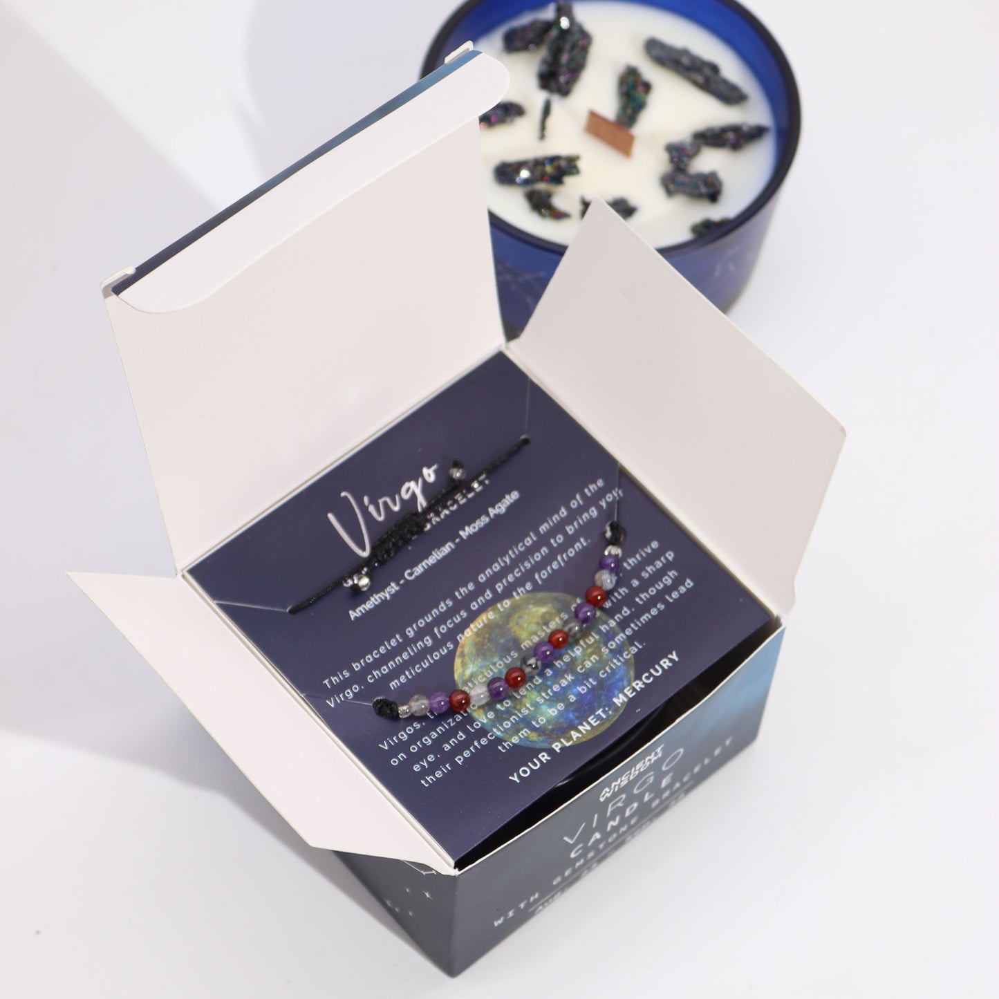 Zodiac Crystal Candle Virgo with Gemstone Bracelet boxed is beautifully presented in a midnight blue glass jar adorned with silver-embossed star sign constellations. 