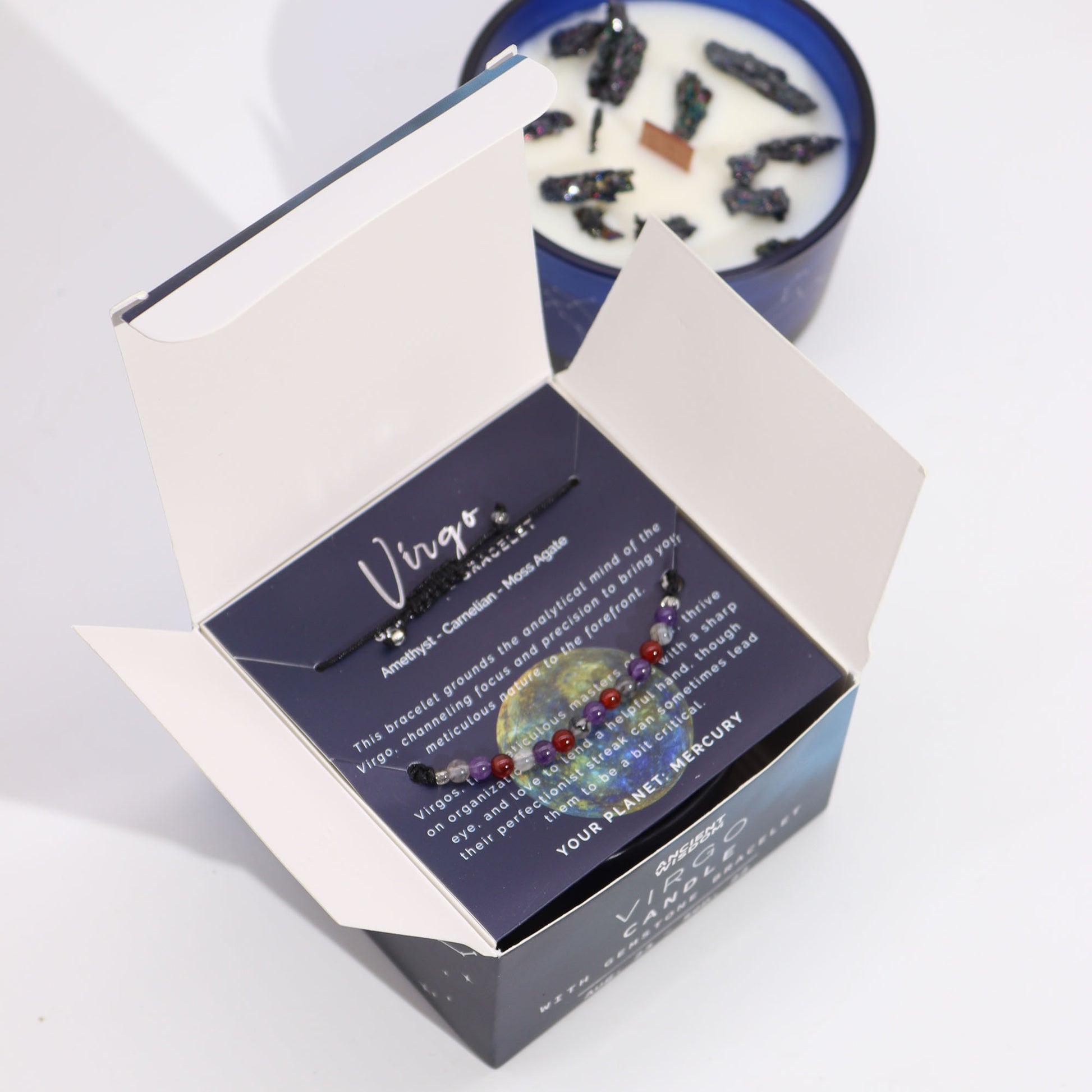 Zodiac Crystal Candle Virgo with Gemstone Bracelet boxed is beautifully presented in a midnight blue glass jar adorned with silver-embossed star sign constellations. 