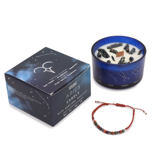 Zodiac Crystal Candle Aries with Gemstone Bracelet is beautifully presented in a midnight blue glass jar adorned with silver-embossed star sign constellations. 