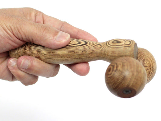 hand holding Massage Tool - Hand Ball Roller
