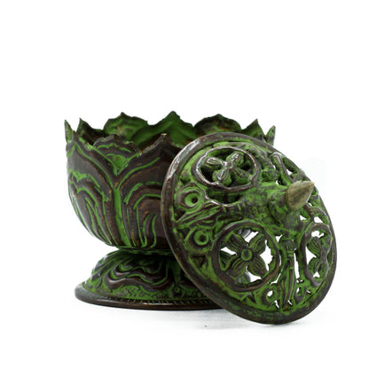 Decorative green and brown metal box with intricate designs on a white background
