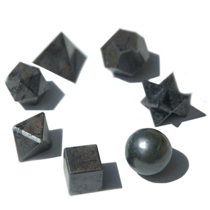 Set of gray geometric stone shapes on a white background