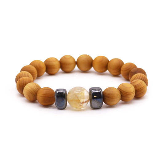 Wooden beaded bracelet with colorful focal beads on a white background