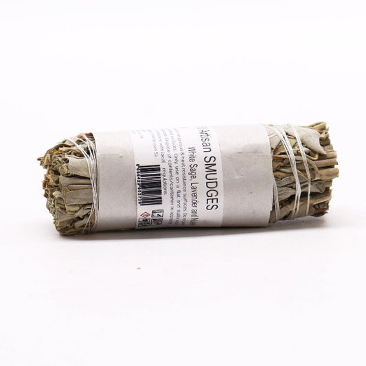 Rolled sage smudge stick with a label on a white background