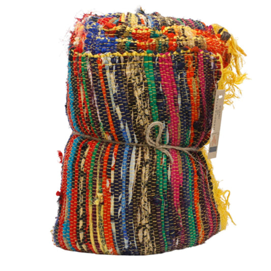 Multicolored woven bag with a tag on a white background