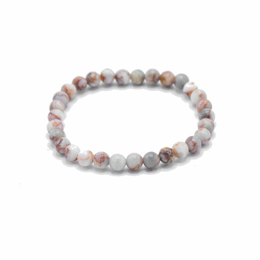 Beaded bracelet with multicolor stones on a white background