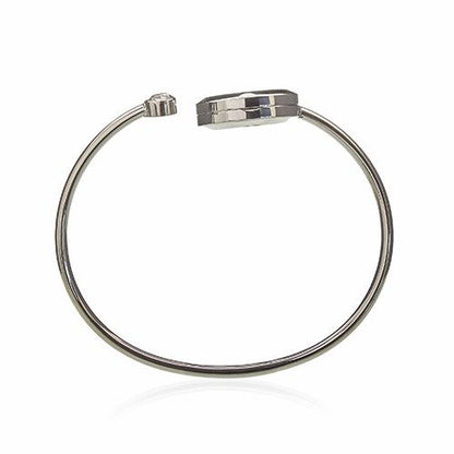 Silver bangle on a white background