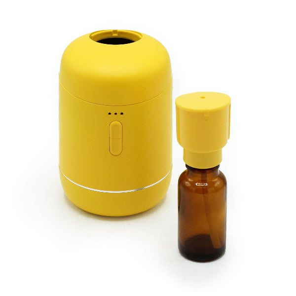 Yellow container and brown bottle with yellow cap on a white background