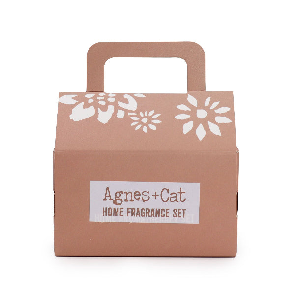 Brown box with floral design and 'Agnes + Cat' label on a white background