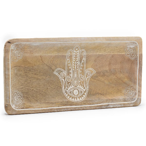 Wooden tray with Hamsa hand design on a white background