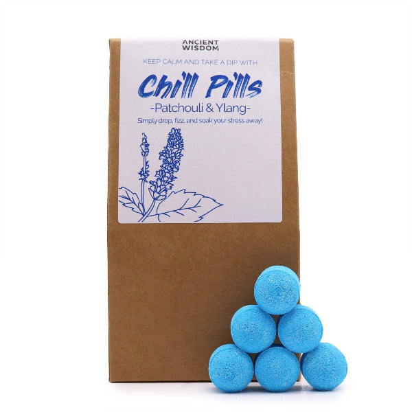 Box of 'Chill Pills' with blue spherical objects in front on a white background