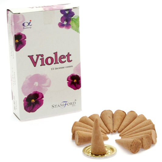 Box of Violet incense cones with cones and holder on a white background