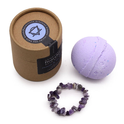 Bath bomb, bracelet, and packaging on a white background