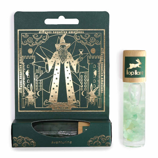 Packaged product with green and gold design, featuring a tube of green beads on a white background.