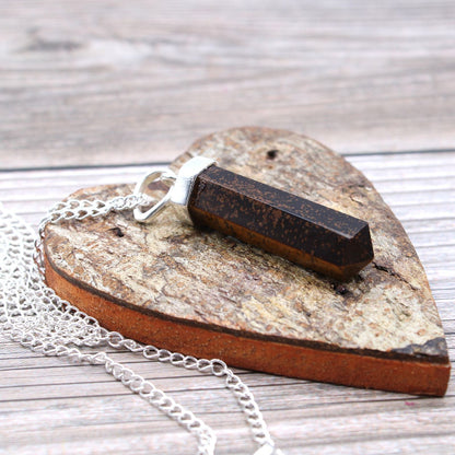 Necklace with a rectangular pendant on a heart-shaped stone