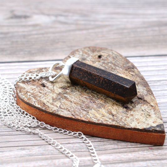 Necklace with a rectangular pendant on a heart-shaped stone