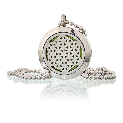 Silver pendant with geometric design on a white background