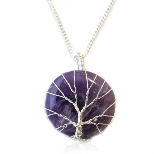 Amethyst tree of life pendant on a white background