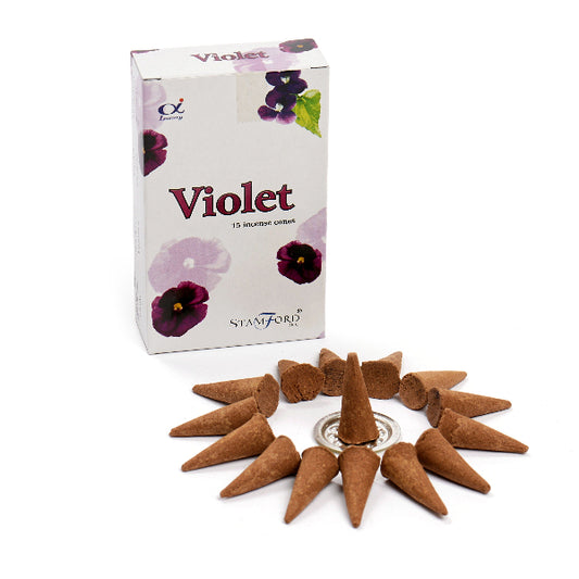 Violet incense cones with packaging on a white background