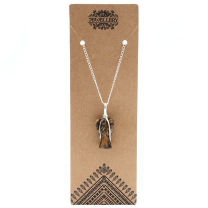 Necklace with a tiger eye pendant on a brown jewelry card