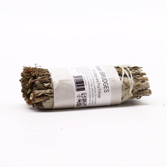 Rolled sage smudge stick with label on a white background