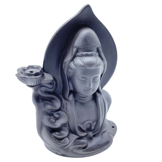 Statue of a hooded figure with a flower on a white background