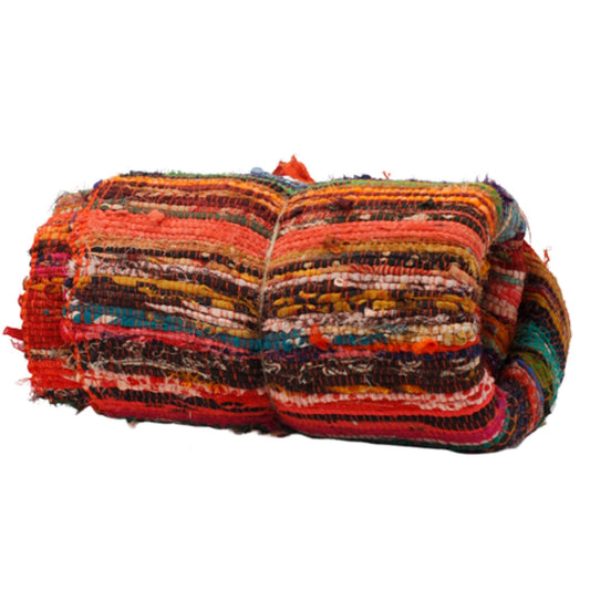 Multicolored woven fabric roll on a white background