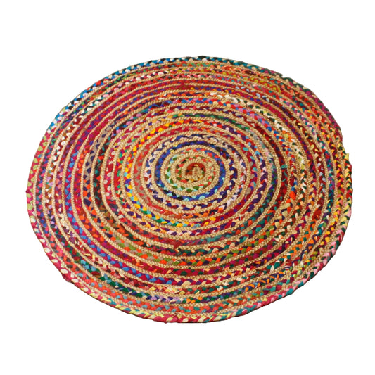 Multicolored braided rug on a wooden floor