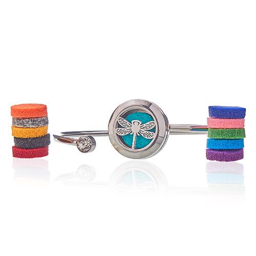 Bangle with dragonfly design and colorful felt pads on a white background