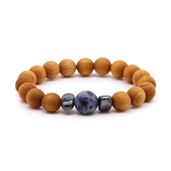 Wooden beaded bracelet with blue and gray stones on a white background
