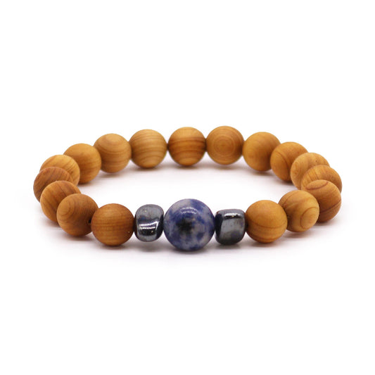 Wooden beaded bracelet with blue and gray stones on a white background