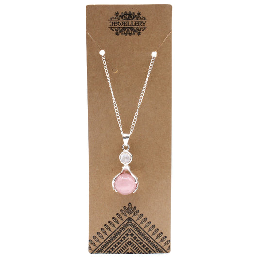 Necklace with pink pendant on a JEGJELLERY branded card
