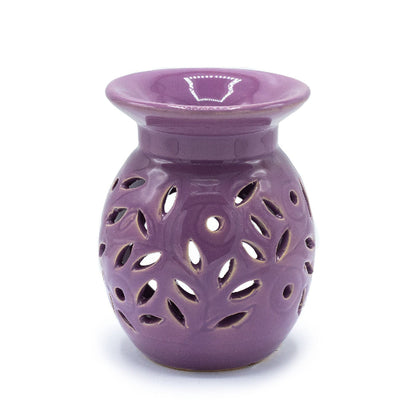 Purple ceramic oil burner with floral design on a white background