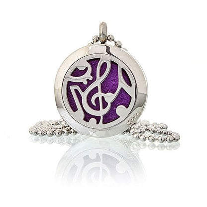 Silver pendant with a purple symbol on a white background