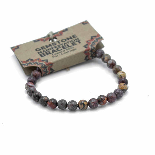 Gemstone bracelet on a white background with a label