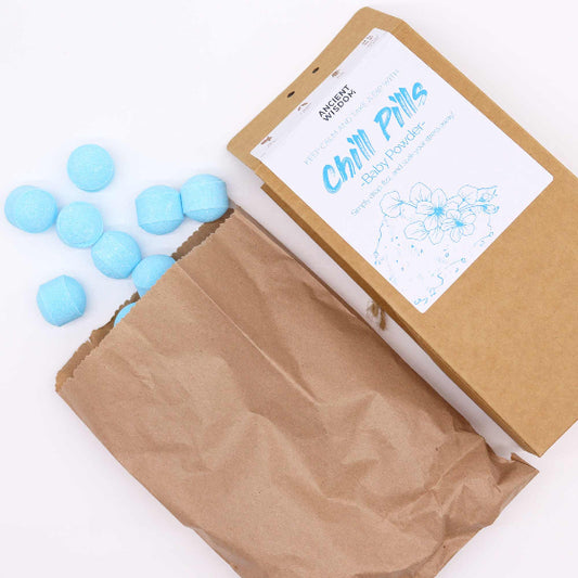 Box of 'Chill Pills' with blue balls on a white background