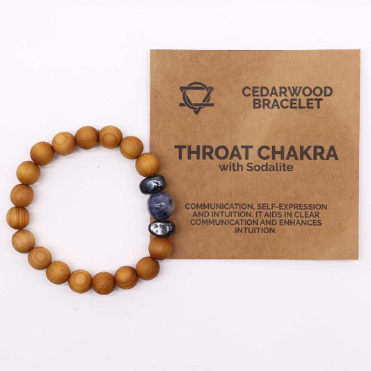 Wooden bracelet with sodalite stones on a Cedarwood Bracelet branded card.