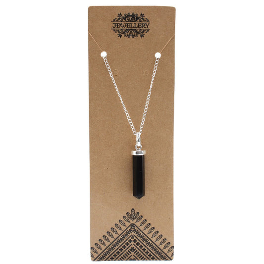 Necklace with a black pendant on a brown card with 'Jewellery' branding.