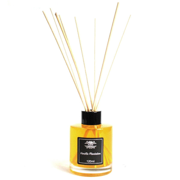 Reed diffuser with vanilla scent on a white background