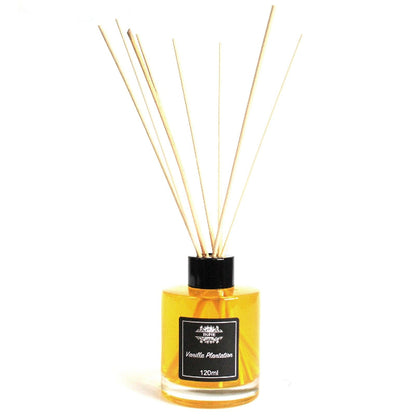 Reed diffuser with vanilla scent on a white background