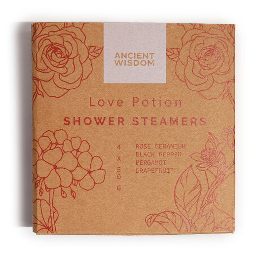 Box of 'Love Potion' shower steamers with floral designs and 'Ancient Wisdom' branding.