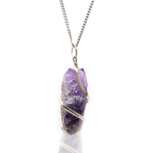 Necklace with a purple crystal pendant on a white background