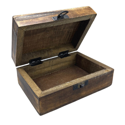 Wooden jewelry box with a hinged lid on a white background
