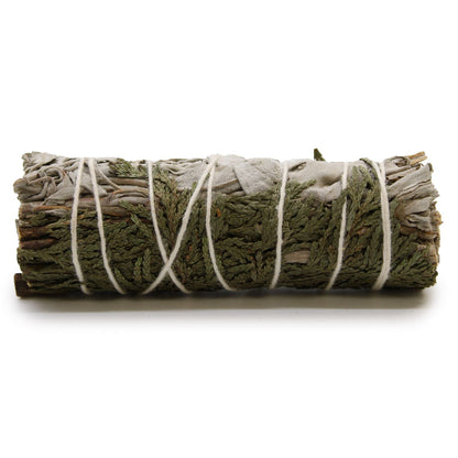 Rolled sage bundle tied with white string on a white background