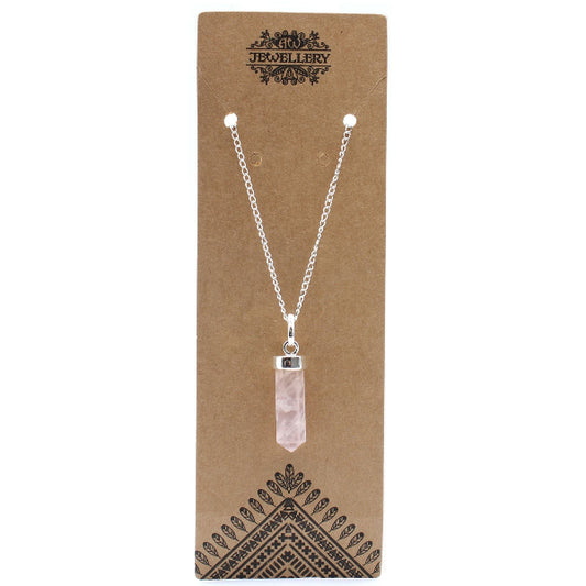 Necklace with a clear pendant on a brown card with 'Jewellery' branding.