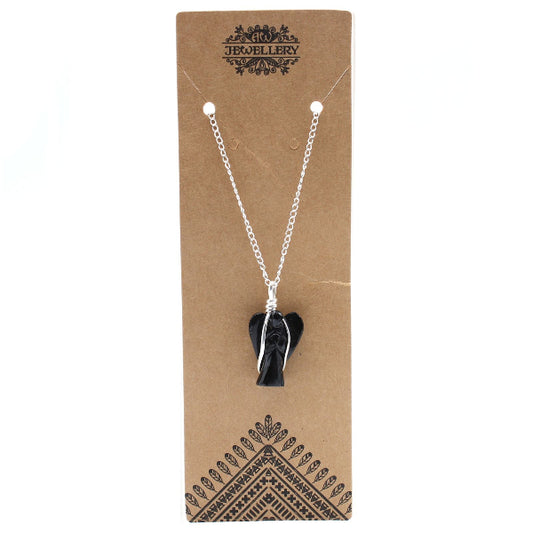 Necklace with a black pendant on a brown jewelry card