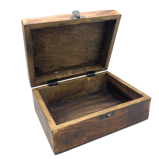 Wooden box with a hinged lid on a white background